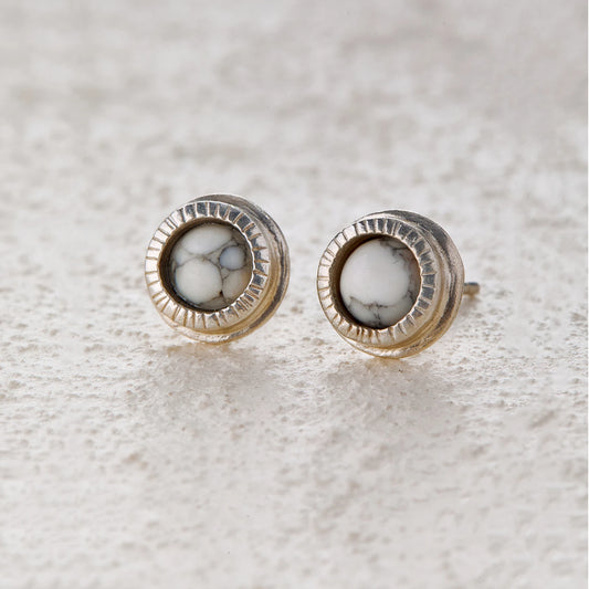 Round white turquoise silver stud earrings with moon-inspired design