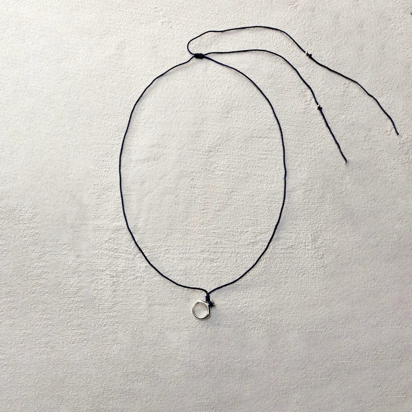 ensage-tokyo-circular-flask-necklace-925-sterling-silver-polished-ring-pendant-with-stopper-blue-braided-cord