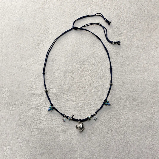 ensage-tokyo-nomads-vessel-necklace-blue-braided-cotton-cord-silver-flask-pendant-turquoise-beads