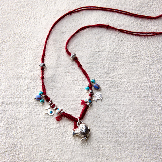 ensage-tokyo-nomads-vessel-necklace-red-braided-cotton-cord-silver-flask-pendant-turquoise-beads-charms