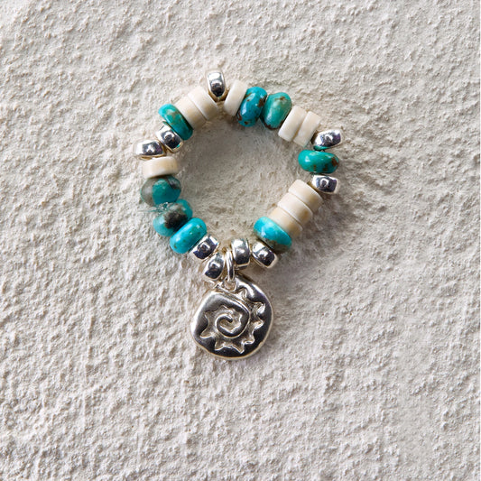 Handmade ring with turquoise, white turquoise beads and solar totem charm