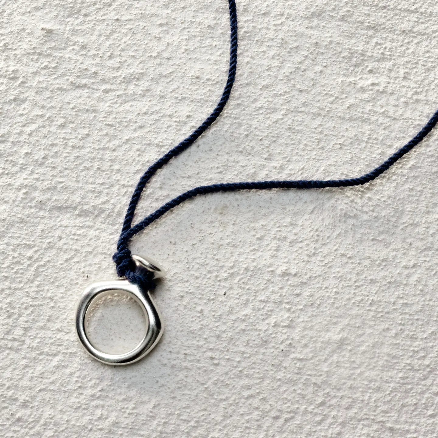 ensage-tokyo-circular-flask-necklace-925-sterling-silver-polished-ring-pendant-with-stopper-blue-braided-cord