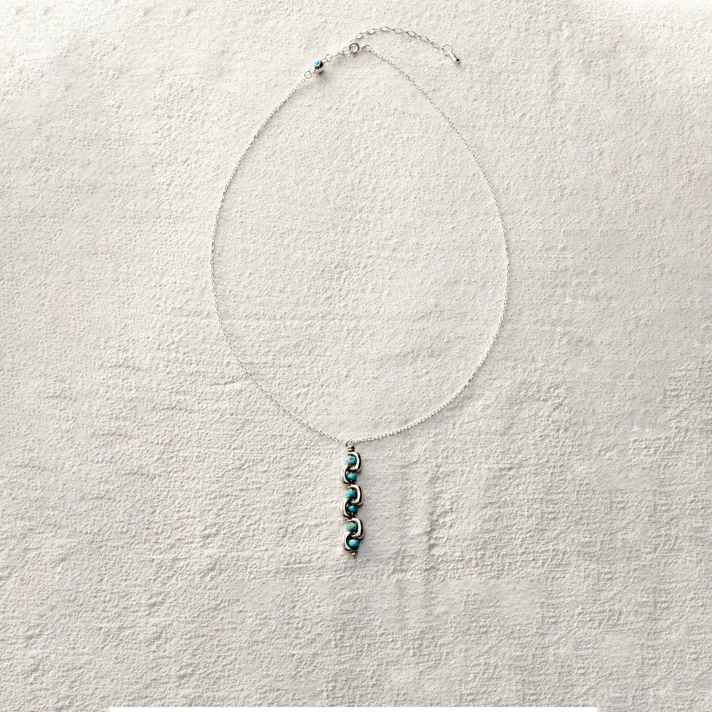ensage-tokyo-echo-of-e-necklace-925-sterling-silver-interlocking-curves-natural-turquoise-beads-pendant