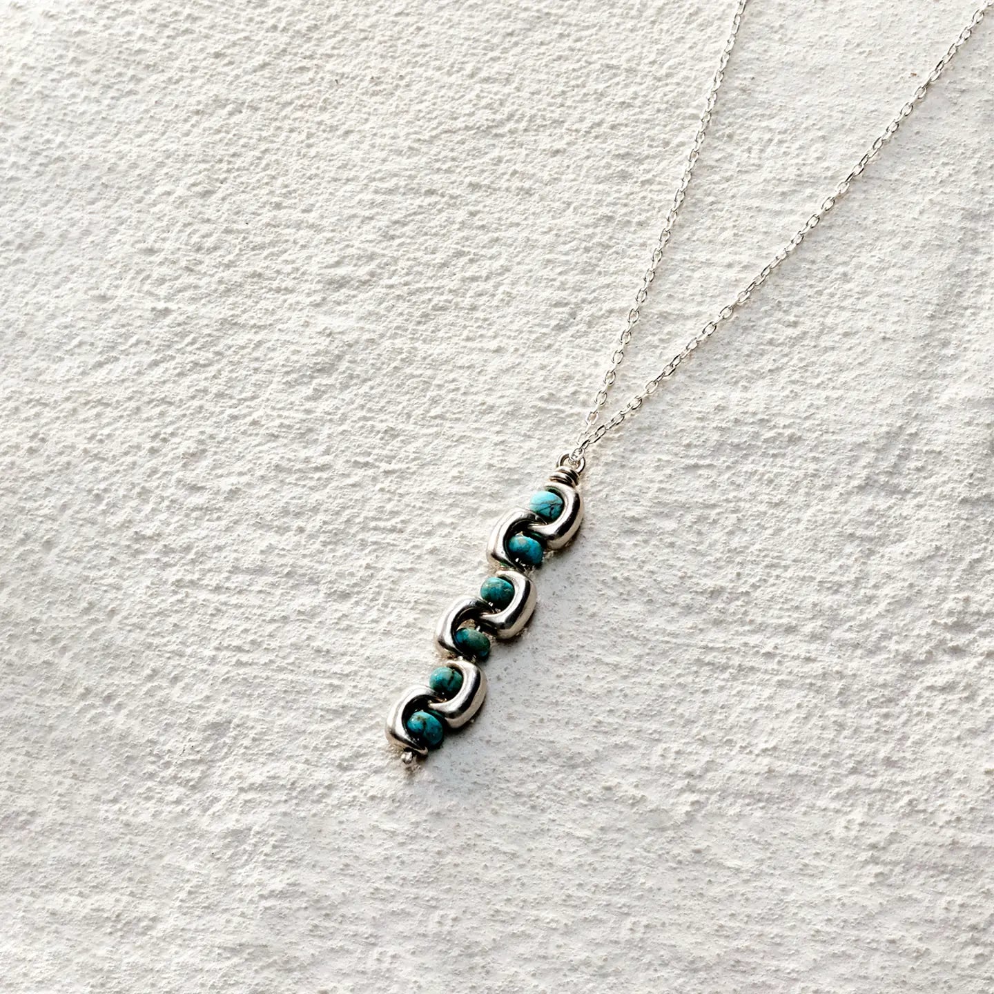 ensage-tokyo-echo-of-e-necklace-925-sterling-silver-interlocking-curves-natural-turquoise-beads-pendant