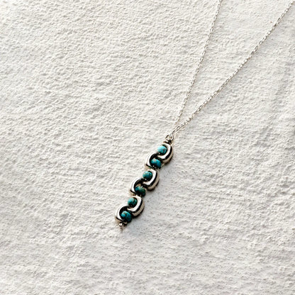 ensage-tokyo-echo-of-e-necklace-925-sterling-silver-interlocking-curves-natural-turquoise-beads-pendant
