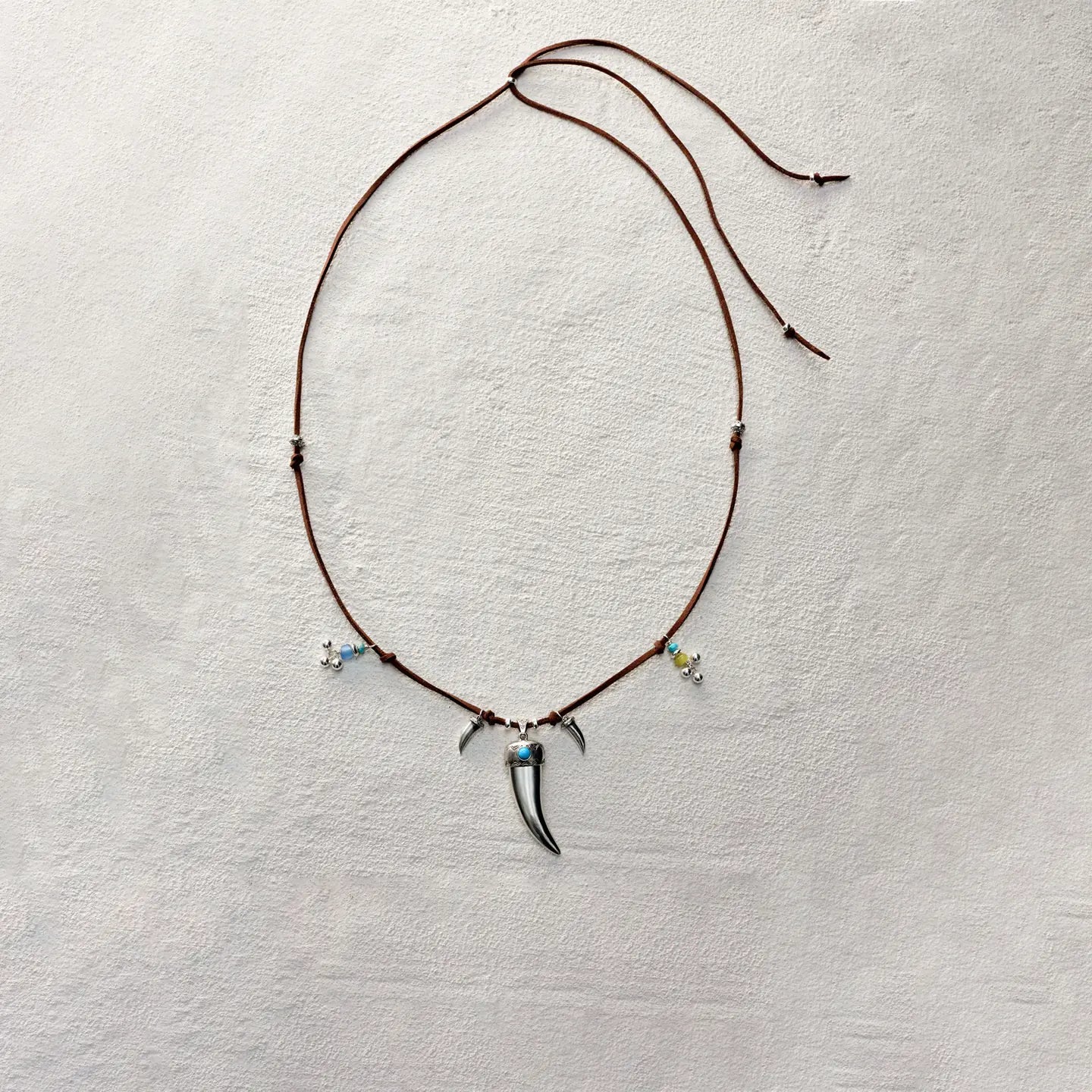 ensage-tokyo-fang-of-the-wild-necklace-large-925-sterling-silver-fang-pendant-turquoise-inlay-beaded-leather-cord