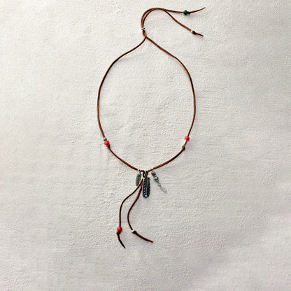 ensage-tokyo-feather-talisman-necklace-brown-leather-cord-925-silver-feather-pendant-turquoise-red-beads