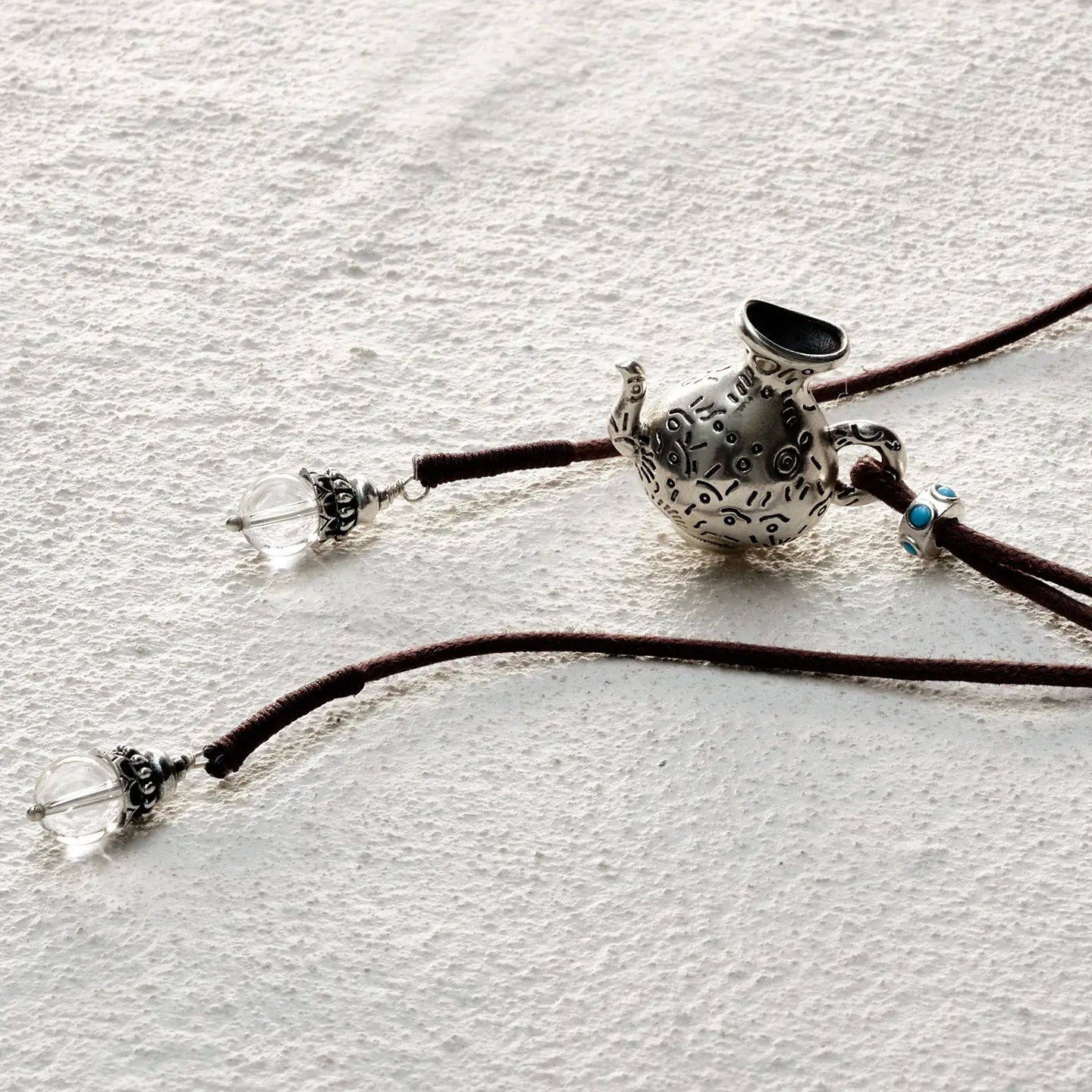 ensage-tokyo-nomads-flask-necklace-925-sterling-silver-etched-vessel-pendant-clear-quartz-charms-brown-cord