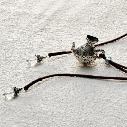 ensage-tokyo-nomads-flask-necklace-925-sterling-silver-etched-vessel-pendant-clear-quartz-charms-brown-cord