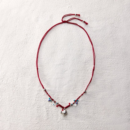 ensage-tokyo-nomads-vessel-necklace-red-braided-cotton-cord-silver-flask-pendant-turquoise-beads-charms