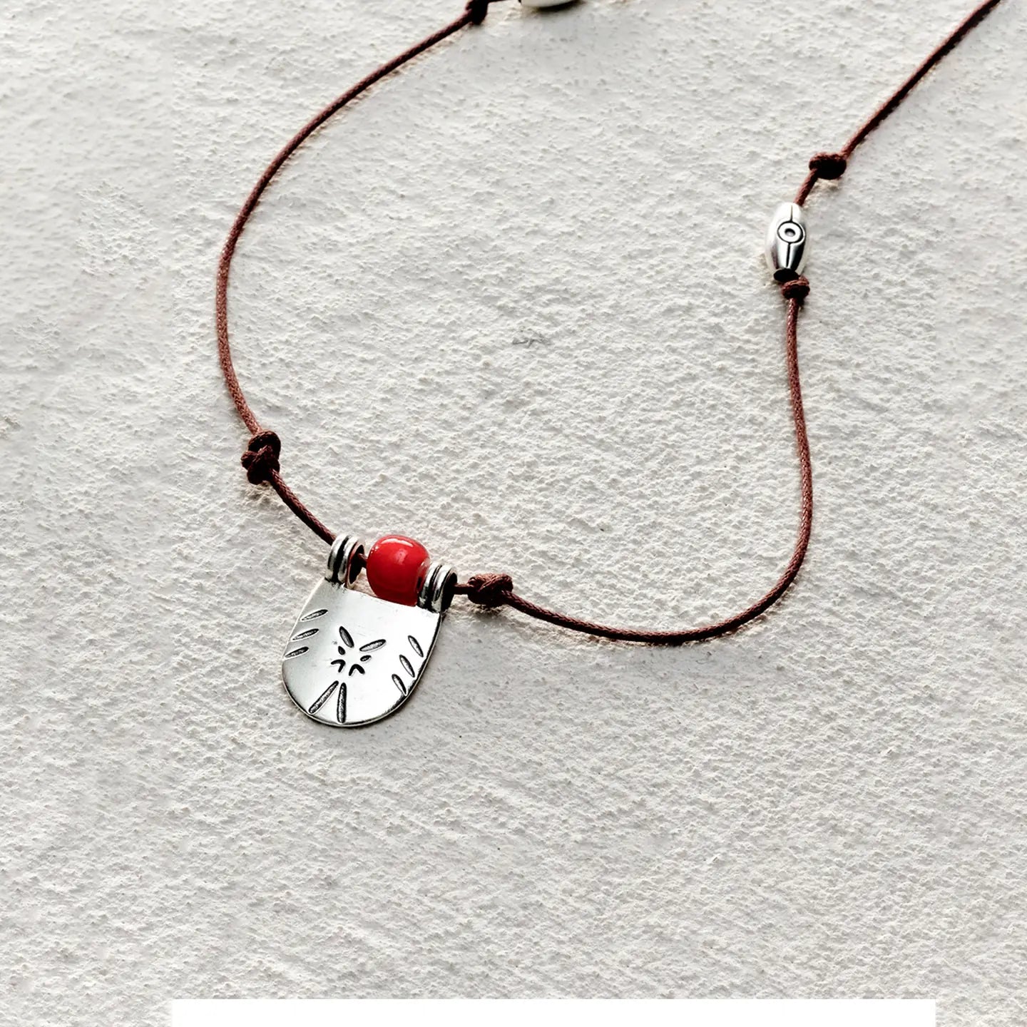 ensage-tokyo-seal-of-sunset-necklace-925-sterling-silver-engraved-shield-pendant-red-glass-bead-brown-wax-cord