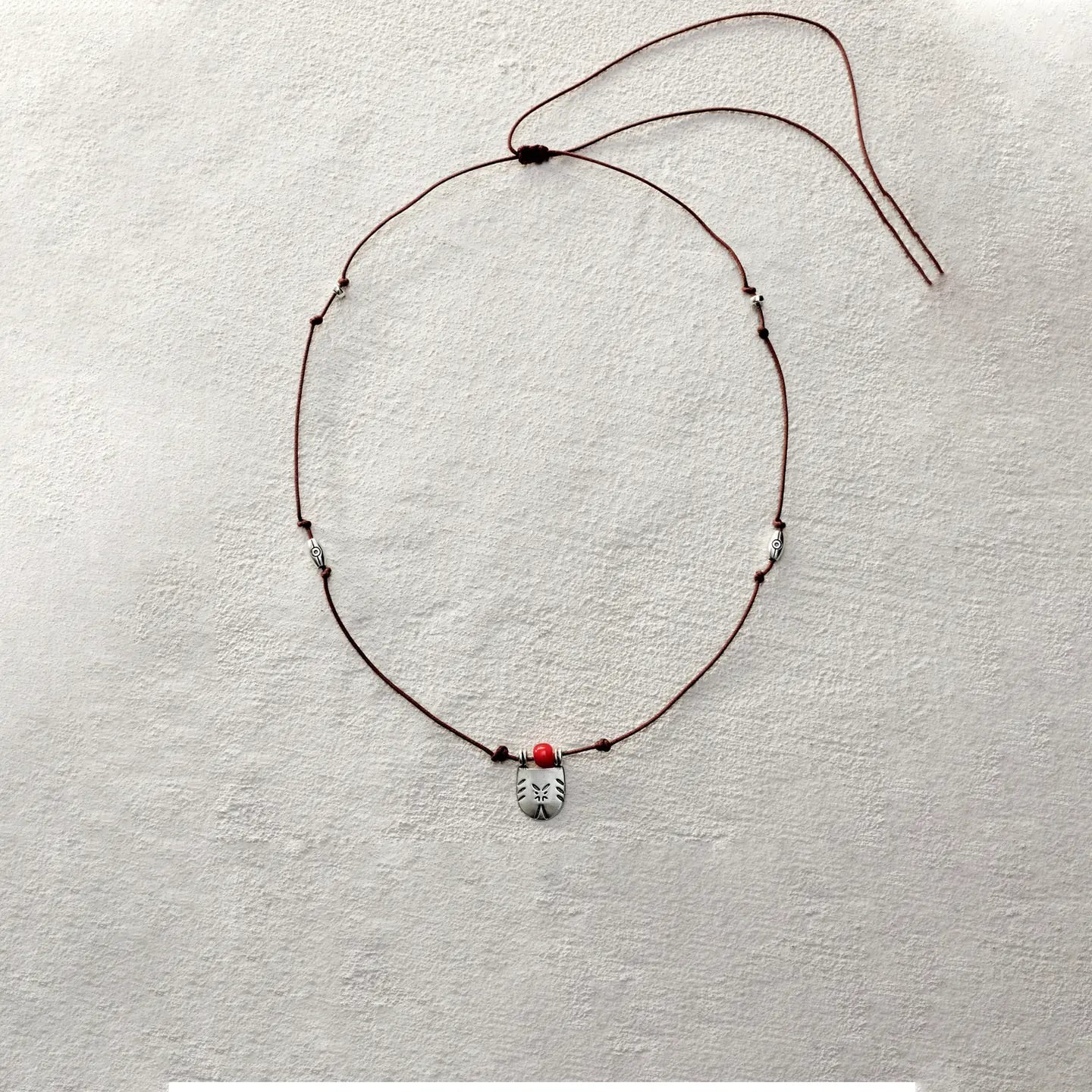 ensage-tokyo-seal-of-sunset-necklace-925-sterling-silver-engraved-shield-pendant-red-glass-bead-brown-wax-cord