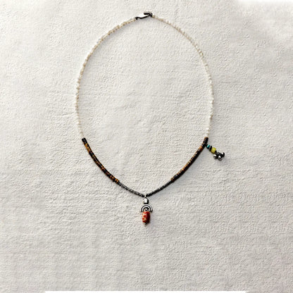 ensage-tokyo-trace-of-the-sun-necklace-white-shell-tiger-eye-oxidized-silver-agate-pendant-turquoise-charm
