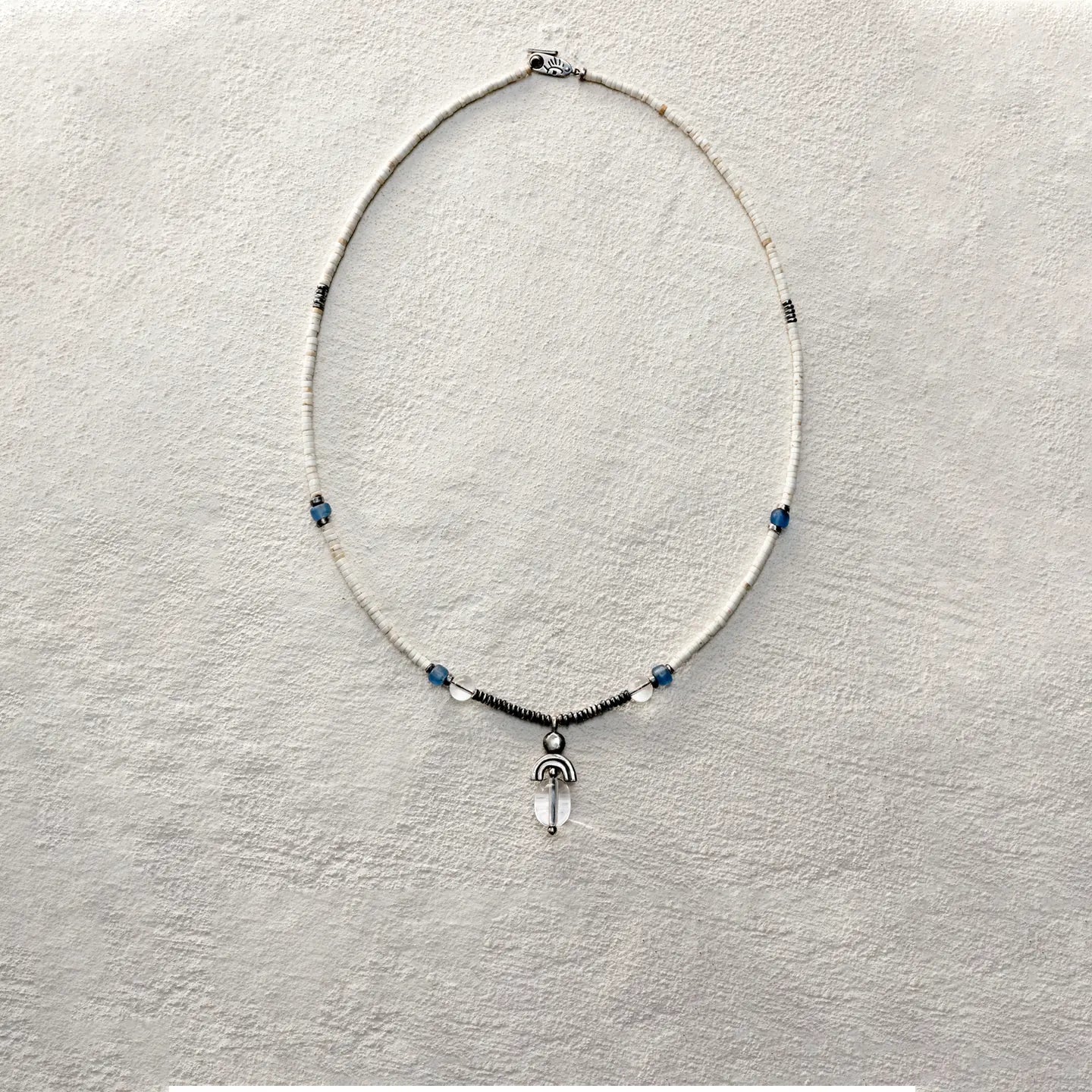 ensage-tokyo-trace-of-the-wind-necklace-loulan-ancient-beads-oxidized-silver-clear-quartz-pendant-blue-accents